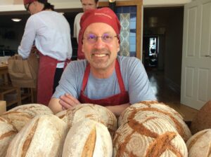 Eric Pallant and loaves of bread